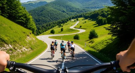 Cyclists on a road in the Carpathian Mountains.の写真素材