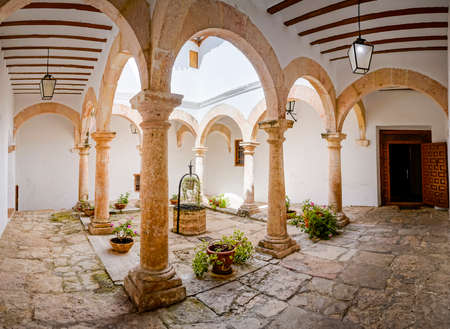 Panoramic of Castilian patio with well in the centerのeditorial素材