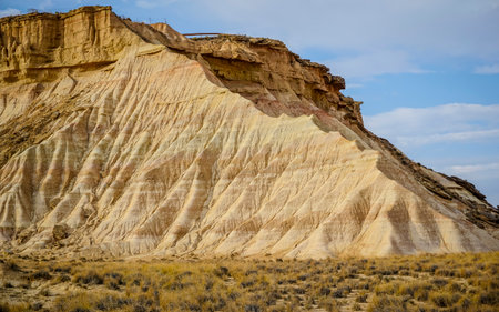 Bardenas Reales Natural Park, an extensive desert region located in the province of Navarra, with imposing canyons, limestone cliffs and rocky outcropsの写真素材