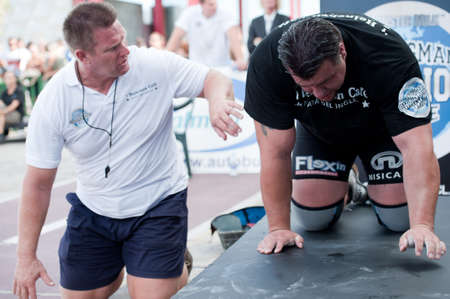CANARY ISLANDSâSEPTEMBER 03:Arno Hams from Holland got injured during Strongman Champions League in Las Palmas September 03, 2011 in Canary Islands, Spainのeditorial素材