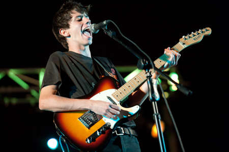 CANARY ISLANDS - JULY 22: Guitarist Toni Diaz from the band El Viejo Astra from Spain, performs onstage during a music festival on July 22, 2011 in Las Palmas, Canary Islands, Spainのeditorial素材