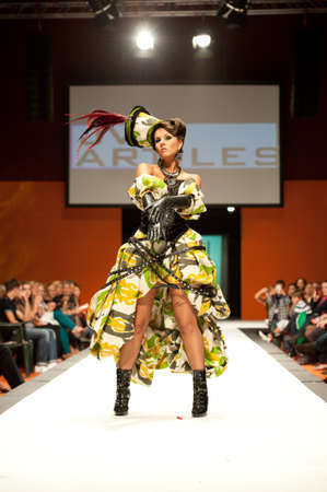 CANARY ISLANDS - 29 OCTOBER: Model on the catwalk wearing carnival costume from designer Julio Vicente Artiles during Carnival Fashion Week October 29, 2011 in Canary Islands, Spainのeditorial素材