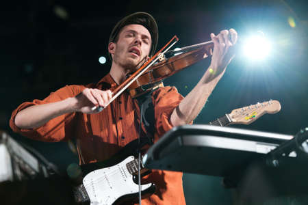 CANARY ISLANDS - NOVEMBER 12: Chapelier Fou from Francia playing in his one-man-band onstage during Womad 2011 November 12, 2011 in Las Palmas, Canary islands, Spainのeditorial素材