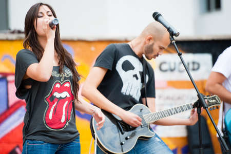 LAS PALMAS, SPAIN-APRIL 13: Ari Barba Guerrero(l) and Nestor Hernandez Rey(r) of group Wings of Volund, from Canary Islands, perform during a charity for Sahara on April 13, 2012 in Las Palmas, Spainのeditorial素材