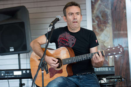 LAS PALMAS, SPAIN-SEPTEMBER 29, 2012: Guitarist Gustavo Alonso playing in the new band Diskonectid, from Canary islands, during a concert at music bar La Guarida del Blues.のeditorial素材