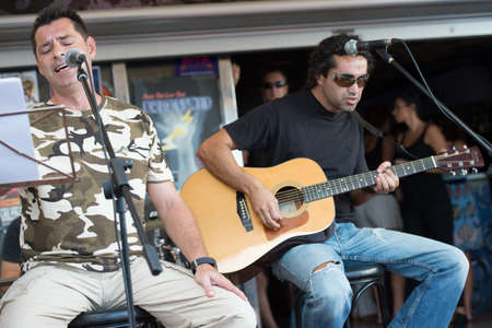 LAS PALMAS, SPAIN-SEPTEMBER 29, 2012: Singer Juanma Rodriguez (l) and guitarist Zack Monzon (r) playing in the new band Diskonectid, from Canary islands, during a concert at music bar La Guarida del Blues.のeditorial素材