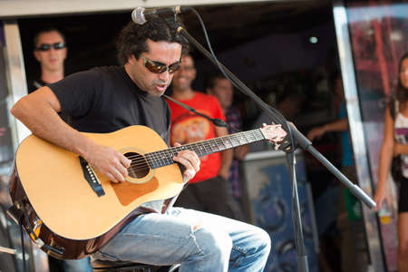 LAS PALMAS, SPAIN-SEPTEMBER 29, 2012: Guitarist Zack Monzon (right) playing in the new band Diskonectid, from Canary islands, during a concert at music bar La Guarida del Blues.のeditorial素材