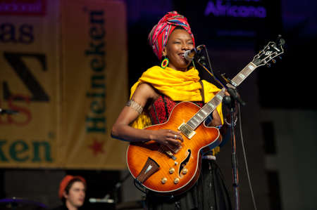 CANARY ISLANDS - JULY 8  Fatoumata Diawara singer and guitarist from Paris, performing onstage during Festival Canarias Jazz   mas July 8, 2011 in Las Palmas, Canary Islands, Spainのeditorial素材