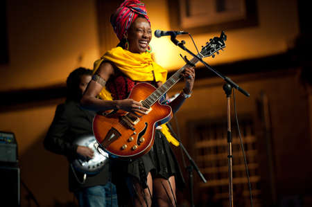 CANARY ISLANDS - JULY 8  Fatoumata Diawara singer and guitarist from Paris, performing onstage during Festival Canarias Jazz   mas July 8, 2011 in Las Palmas, Canary Islands, Spainのeditorial素材
