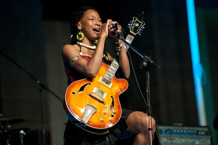 CANARY ISLANDS - JULY 8  Fatoumata Diawara singer and guitarist from Paris, performing onstage during Festival Canarias Jazz   mas July 8, 2011 in Las Palmas, Canary Islands, Spainのeditorial素材