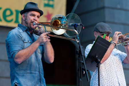 CANARY ISLANDS - JULY 8: Guzman Dominguez with trombone from Naya Band, from Canary Islands, performing onstage during Festival Canarias Jazz & mas July 8, 2011 in Las Palmas, Canary Islands, Spainのeditorial素材