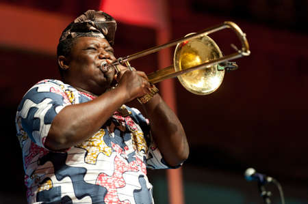 CANARY ISLANDS - JULY 8: Ahouandinou W. Martial from Gangbe Brass Band, from Cotonou-Benin in Africa, performing onstage during Festival Canarias Jazz July 8, 2011 in Las Palmas, Canary Islands,Spainのeditorial素材