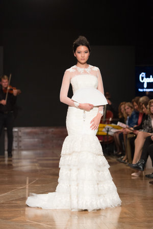 LAS PALMAS, SPAIN-MARCH 13, 2015: A model walks the runway wearing a wedding dress from designer Ogadenia Diaz during Gran Canaria Moda Calida 2016 Bridal Collection at Museum Nestor.のeditorial素材