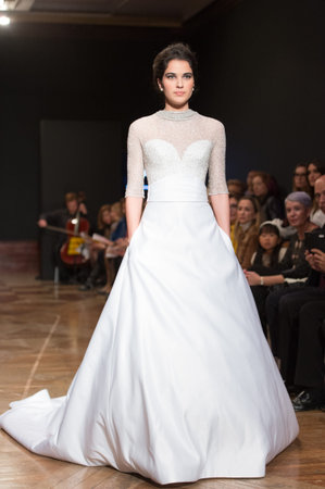 LAS PALMAS, SPAIN-MARCH 13, 2015: A model walks the runway wearing a wedding dress from designer Ogadenia Diaz during Gran Canaria Moda Calida 2016 Bridal Collection at Museum Nestor.のeditorial素材