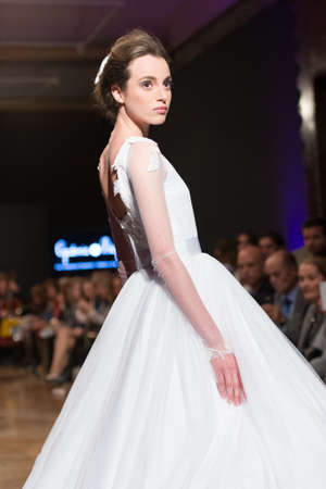 LAS PALMAS, SPAIN-MARCH 13, 2015: A model walks the runway wearing a wedding dress from designer Ogadenia Diaz during Gran Canaria Moda Calida 2016 Bridal Collection at Museum Nestor.のeditorial素材