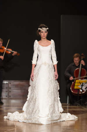 LAS PALMAS, SPAIN-MARCH 13, 2015: A model walks the runway wearing a wedding dress from designer Ogadenia Diaz during Gran Canaria Moda Calida 2016 Bridal Collection at Museum Nestor.のeditorial素材