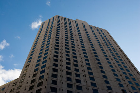 A skyscraper in San Francisco against a blue skyの写真素材