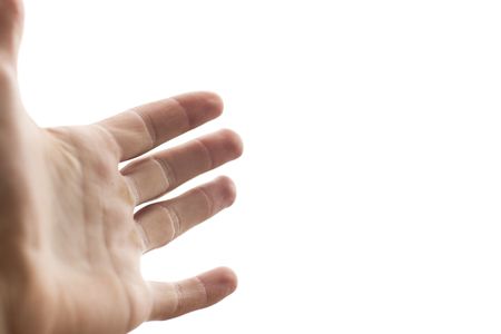 A hand reaching on a white backgroundの写真素材