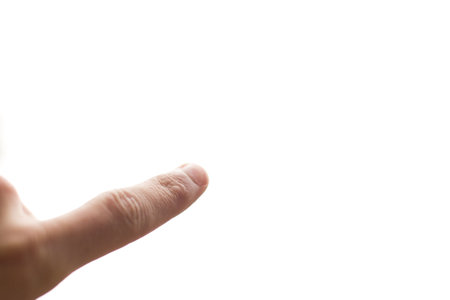 a hand pointing -- isloated on whiteの写真素材