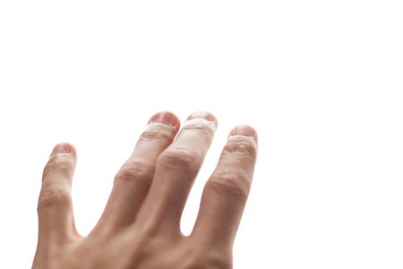 A hand reaching on a white backgroundの写真素材
