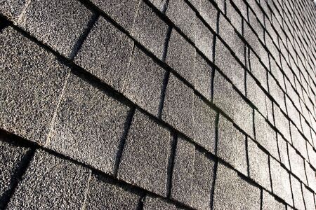 abstract, angled shot of roof shinglesの写真素材