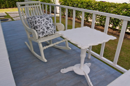 Rocking chair on porchの写真素材