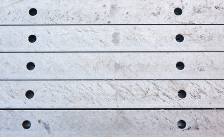 Metal girder in group pattern in row surfaceの写真素材