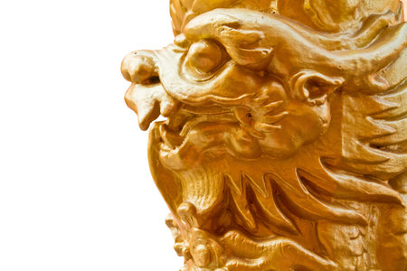 Golden dragon pillars in Chinese temple in Thailand isolated on white backgroundの写真素材