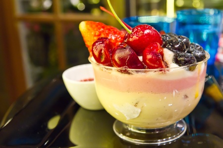 Mixed fruit mousse cake included strawberry raspberry cherry and blackberryの写真素材