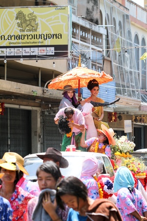 NAKHON SAWAN - APRIL 13 : Female Thai beauty contestant at a Thai Songkran festival Ladyao district market, April 13, 2012 in Nakhon Sawan, Thailand.のeditorial素材