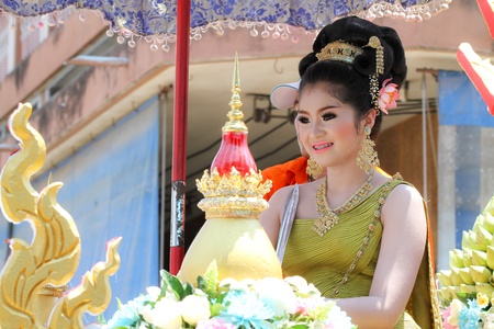 NAKHON SAWAN - APRIL 13 : Female Thai beauty contestant at a Thai Songkran festival Ladyao district market, April 13, 2012 in Nakhon Sawan, Thailand.のeditorial素材