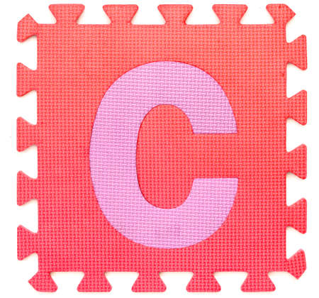 Rubber alphabet C isolated on white backgroundの写真素材