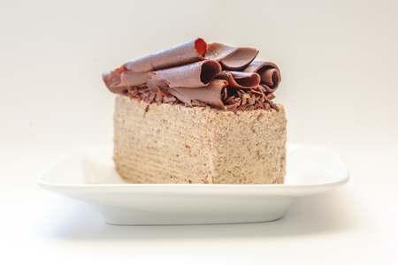 Chocolate on white dish against white backgroundの写真素材