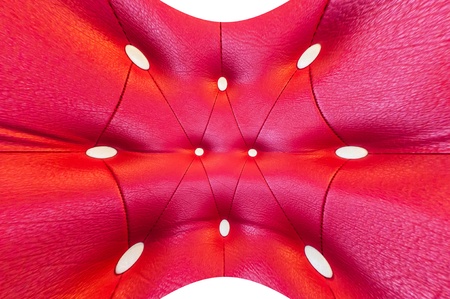 Red luxury vintage style leather with button texture from sofaの写真素材