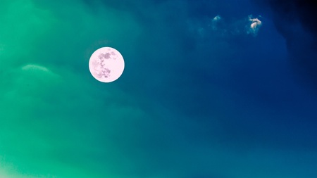 Beautiful full moon with clear blue sky in twilight time backgroundの写真素材