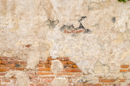 Old orange brick wall  texture backgroundの写真素材