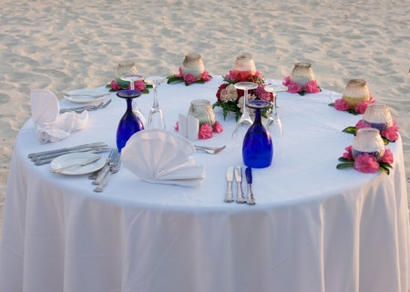 romantic table for two on beachの写真素材