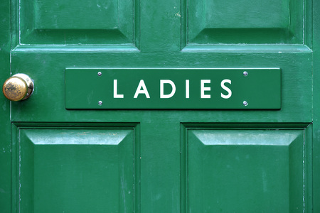 Ladies sign on green victorian toilet doorの写真素材