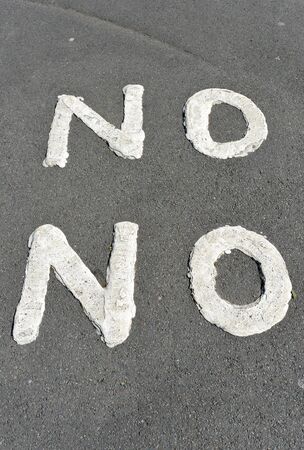 No no painted road signの写真素材