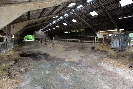 Large empty cattle shed n ex-dairy farmの写真素材