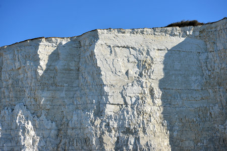 Sheer chalk cliffs on the Sussex coastの写真素材