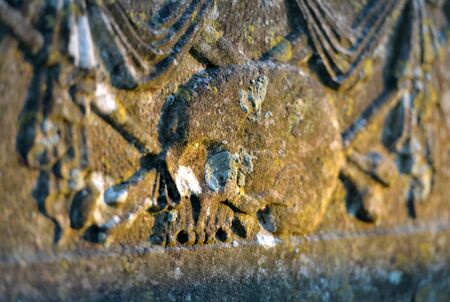 Skull and crossed bones on a Georgian grave stoneの写真素材