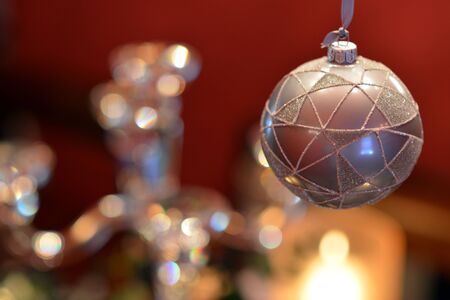 Traditional luxury christmas glass baubles with ribbonsの写真素材