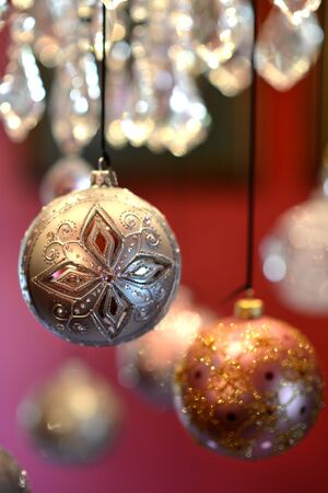 Traditional luxury christmas glass baubles with ribbonsの写真素材