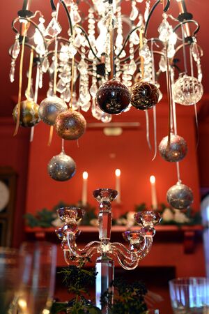 Traditional luxury christmas glass baubles with ribbonsの写真素材