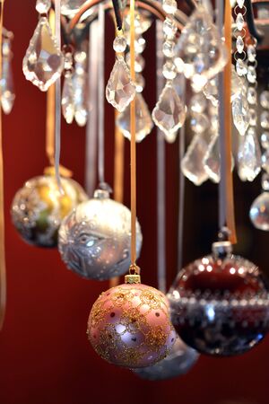 Traditional luxury christmas glass baubles with ribbonsの写真素材