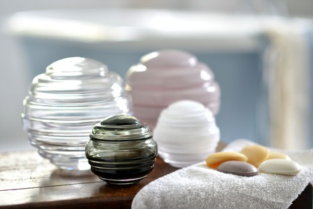 Round decorative glass storage jars in a bathroomの写真素材
