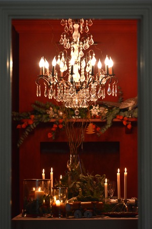 Decorated Christmas table with animal figures and colorful platesの写真素材