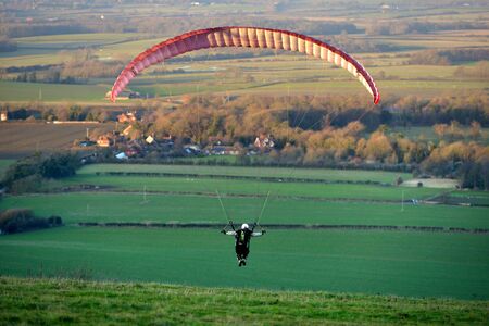 Paragliders taking off from the South Downsの写真素材