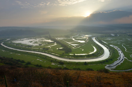 Cuckmere river in the South Downs National Park on a misty morningの写真素材